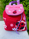 Ladybird backpack, embroidered with the name Jessica
