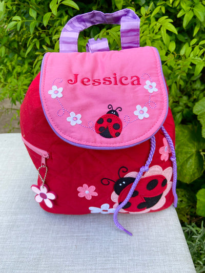 Ladybird backpack, embroidered with the name Jessica
